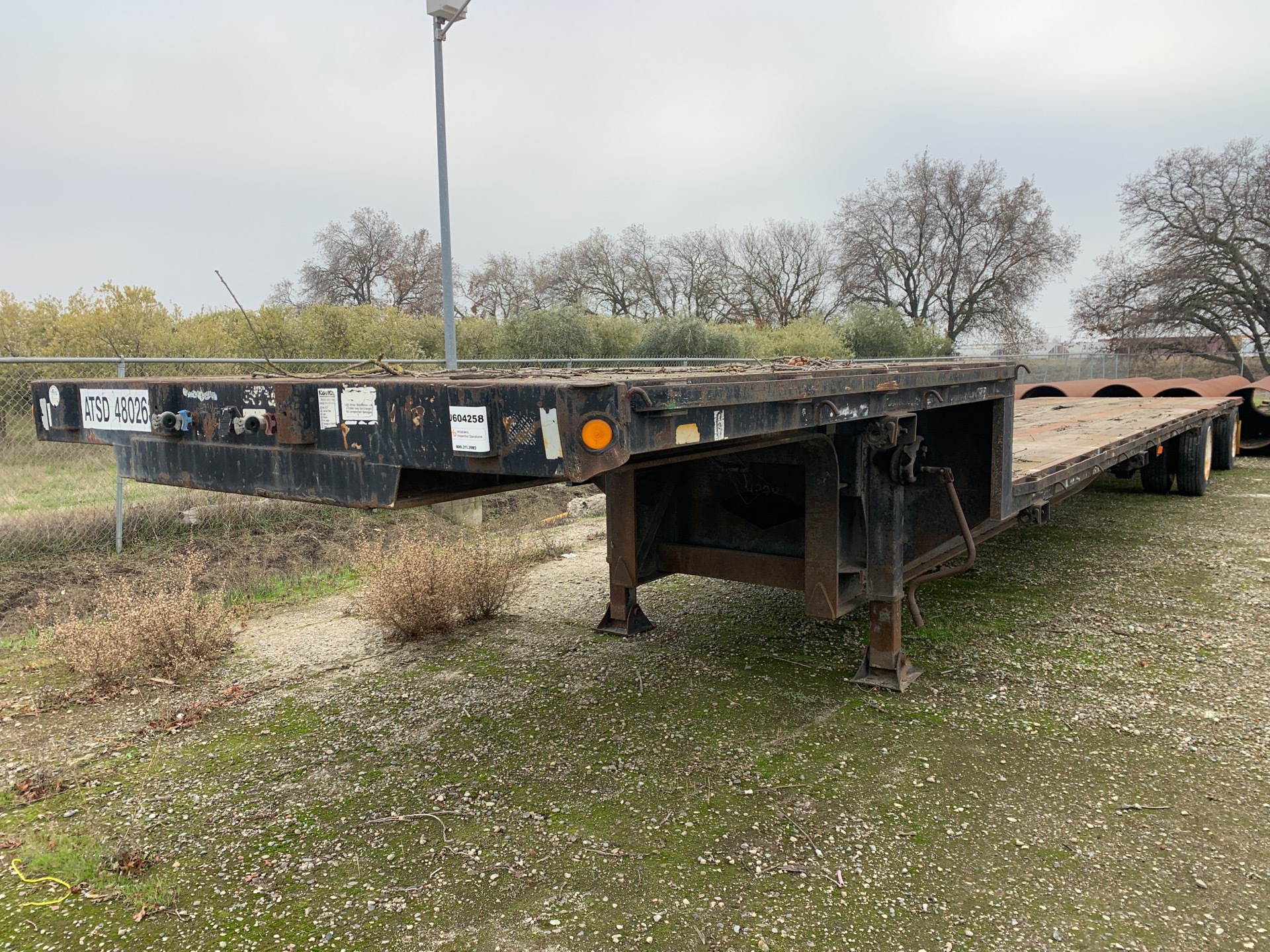 1996 Fontaine DFT-5-8048WSAW 48 ft T/A Step Deck Trailer