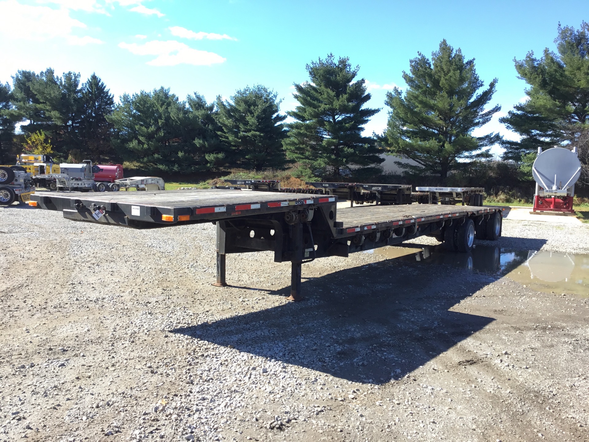 2009 Transcraft DTL2100 T/A Spread Axle Step Deck Trailer